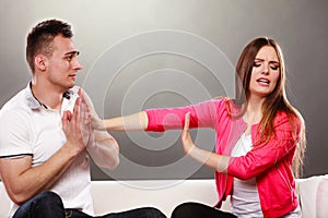 Husband apologizing wife. Angry upset woman.