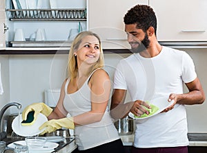 Husband helping girl doing clean up