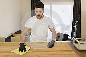 The husband helps his wife with household chores