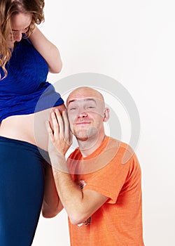 The husband overhears in the belly of his wife