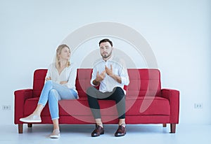 Husband quarrel with wife conflict and boring couple in the living room,Negative emotions