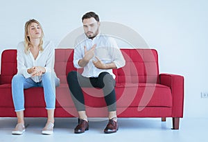 Husband quarrel with wife conflict and boring couple in the living room,Negative emotions