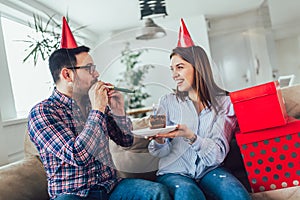 Husband`s birthday.Wife surprise his husband with birthday cake