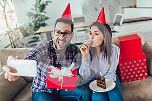 Husband`s birthday.Wife surprise his husband with birthday cake