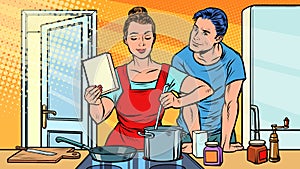 Husband and wife cook in the kitchen