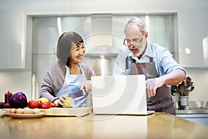 Husband Wife Cooking Searching Menu Tablet Concept