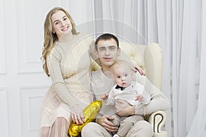 Husband, wife and one year old child