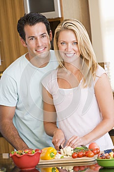 Husband And Wife Preparing meal