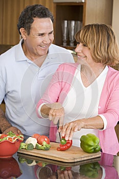 Husband And Wife Preparing Meal