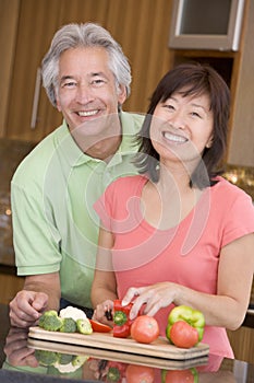 Husband And Wife Preparing meal,mealtime Together