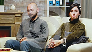 Husband and wife in psychoanalyst cabinet