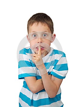 Hush! Tense boy with bulging eyes, finger by lips