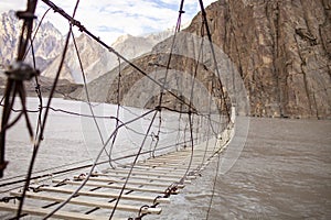 Hussaini Suspension Bridge Over Hunza River In Gojal Valley Of Hunza, Pakistan.