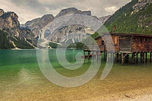 Hut on Braies Lake in Dolomiti mountains and Seeko