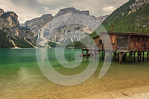 Hut on Braies Lake in Dolomiti mountains and Seeko photo