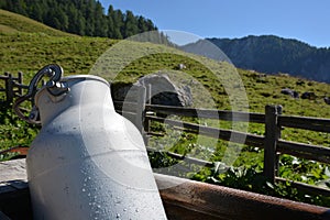 Hut in german alps with milk can