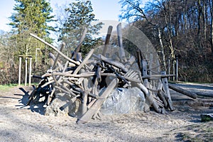 Hut made of tree trunks on stone age playground of Neanderthal Museum, Mettmann, Germany.