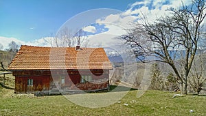 Hut in mountainous landscape.