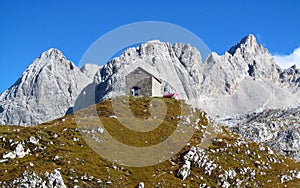The hut, refugio, bivaccoÃÂ Tiziano in the Alps mountains, Marmarole photo