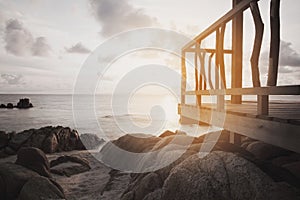 Hut by the sea at sunset