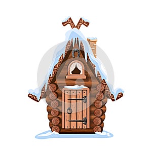 Fairy tale hut made of logs with a snow-covered roof, a stone chimney and a horseshoe for good luck