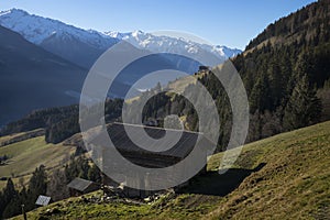 Hut with a view on the snowy mountains, Tirol Austria