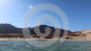 Huts and chalets in a resort on the red sea in Ras Shitan in Sinai photo