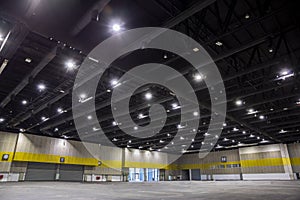 HVAC Duct Cleaning, Ventilation pipes in silver insulation material hanging from the ceiling inside new building warehouse