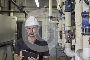 HVAC tech with Tablet