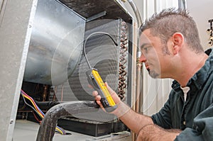 HVAC Technician with Leak Detector photo