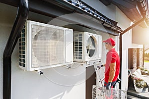 HVAC Technician Performing Air Condition and Heat Pump Units Maintenance