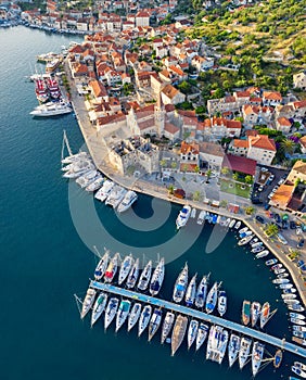 Hvar, Croatia. Aerial view on the old town. Vacation and adventure. Town and sea. Top view from drone at on the old town and azure