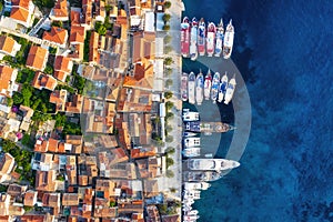 Hvar, Croatia. Aerial view on the old town. Vacation and adventure. Town and sea. Top view from drone at on the old town and azure