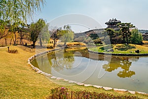 Hwaseong Fortress Banghwasuryujeong with pond at spring in Suwon, Korea