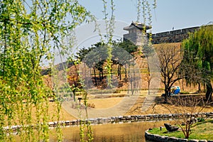 Hwaseong Fortress with pond at spring in Suwon, Korea