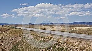 Hwy 191 through a dry Utah towards the horizon