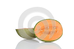 Hybrid cantaloupe honeydew melon sliced in half