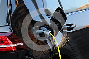 Hybrid car charging power on the street