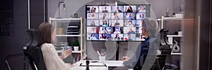 Hybrid office manager leading video conference