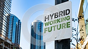 Hybrid Working Future Worn Sign in Downtown city setting photo