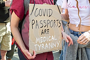 HYDE PARK, LONDON, ENGLAND- 24 April 2021: COVID PASSPORTS ARE MEDICAL TYRANNY placard at an anti-lockdown protest