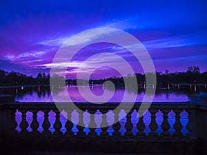 Hyde park at a purple blue sunset, London, UK.
