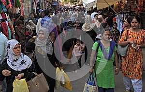 Indian people shopping in the stalls, in an annual exhibition, house hold and personal products