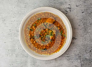 hyderabadi daal chicken served in a plate isolated on background top view of indian and pakistani desi food