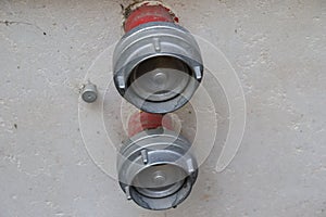 Hydrant connectors on building wall