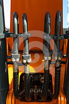 Hydraulic control levers on the tractor. Hydraulic and pneumatic systems for controlling the operation of the plow and mower,
