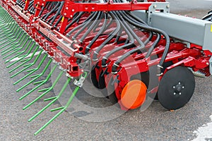 Hydraulic drive connecting agricultural machinery units. Pneumatic hoses and electrical cables at an industrial facility.