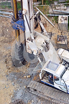 Hydraulic hammer drilling machine at construction site