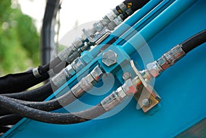 Hydraulic hose connections on industrial equipment photo