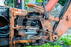 Hydraulic hoses, connections on old dirty excavator